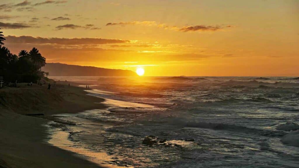 Sun setting at the tip of Kaena Point on the island of Oahu in Hawaii