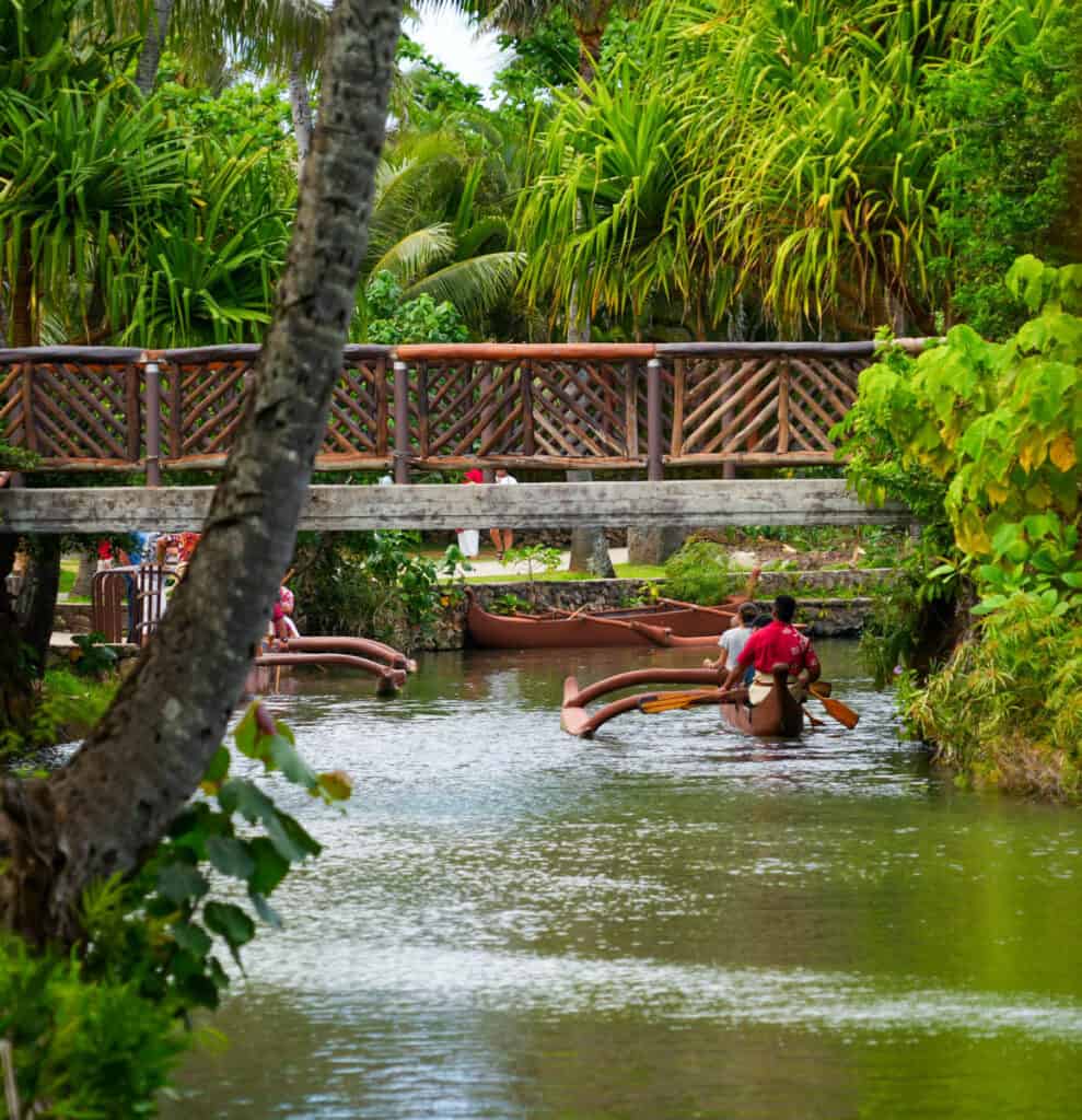 Paddling a canoe at the Polynesian Cultural Center in Oahu, Hawaii