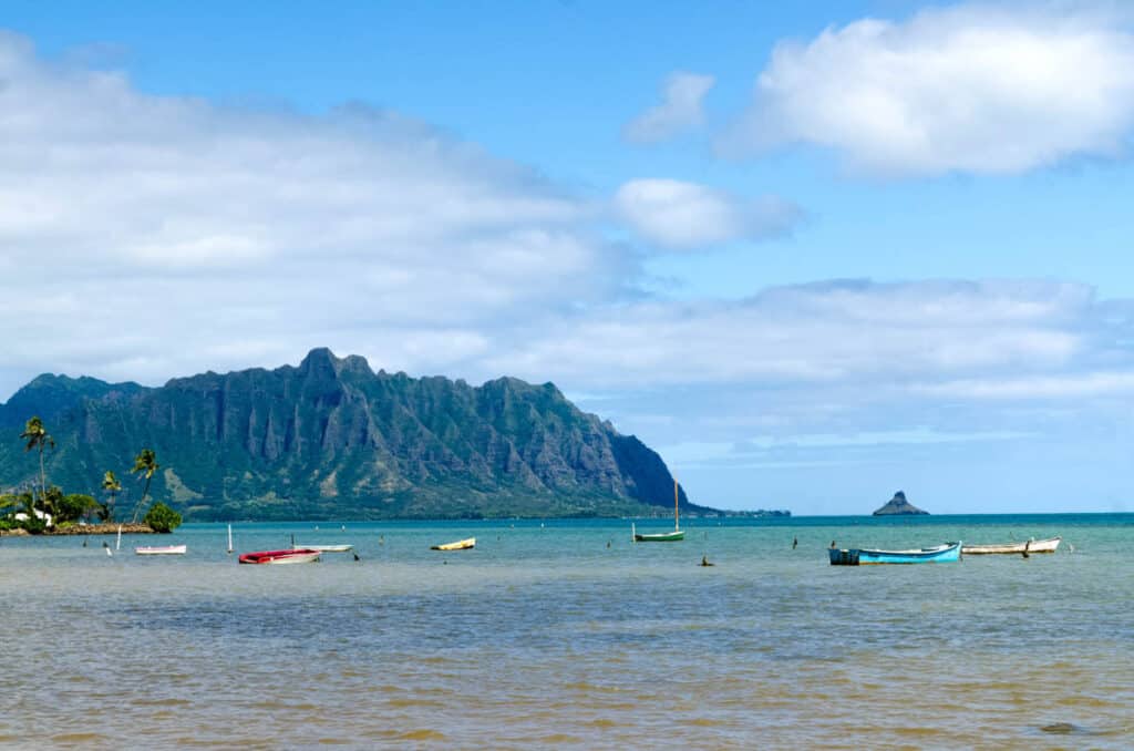 Kaneohe Bay, Koolua Mountains and Chinaman's Hat on the scenic coastal route to the North Shore of Oahu