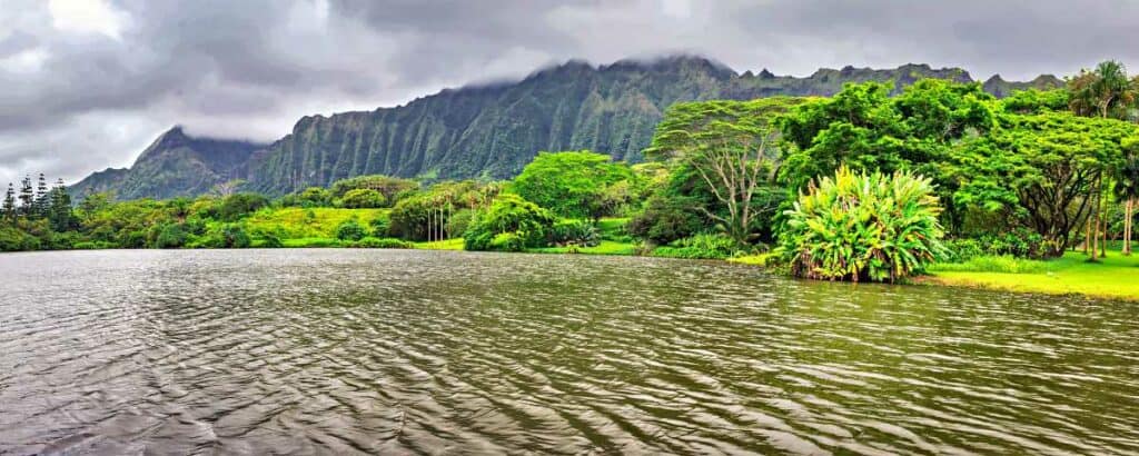 Lake and mountains in Hoomaluhia botanical garden, Oahu island, Hawaii