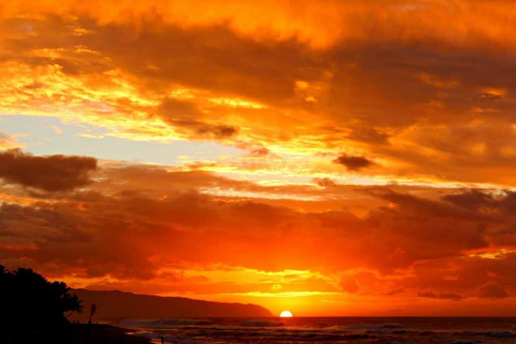 Spectacular sunset at Sunset Beach Park near Waimea Valley