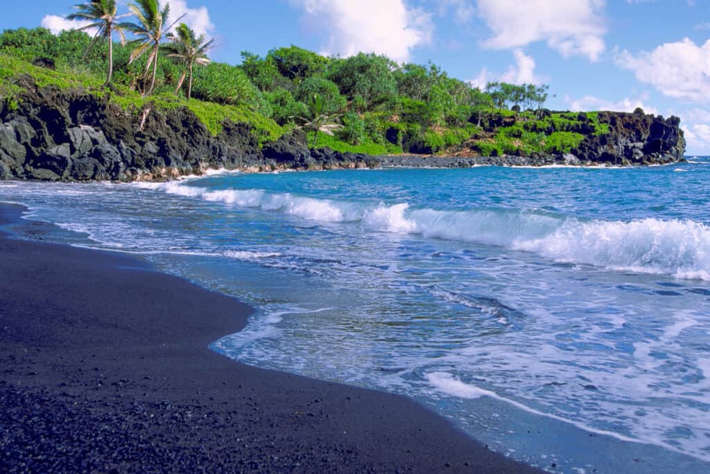 Black sand beach Hana on a sunny day in maui, HI