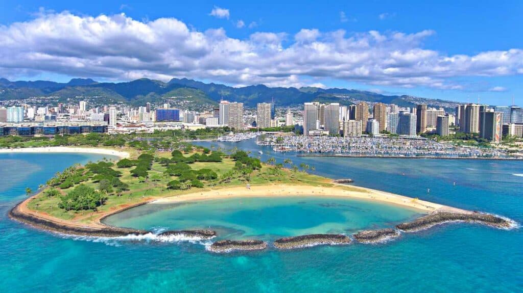 Magic Island in Ala Moana area with Waikiki and Honolulu in the background on the island of Oahu in Hawaii