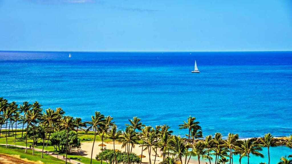A relaxing stroll along the stunning beachfront resort trail, one of the best things to do in Ko Olina