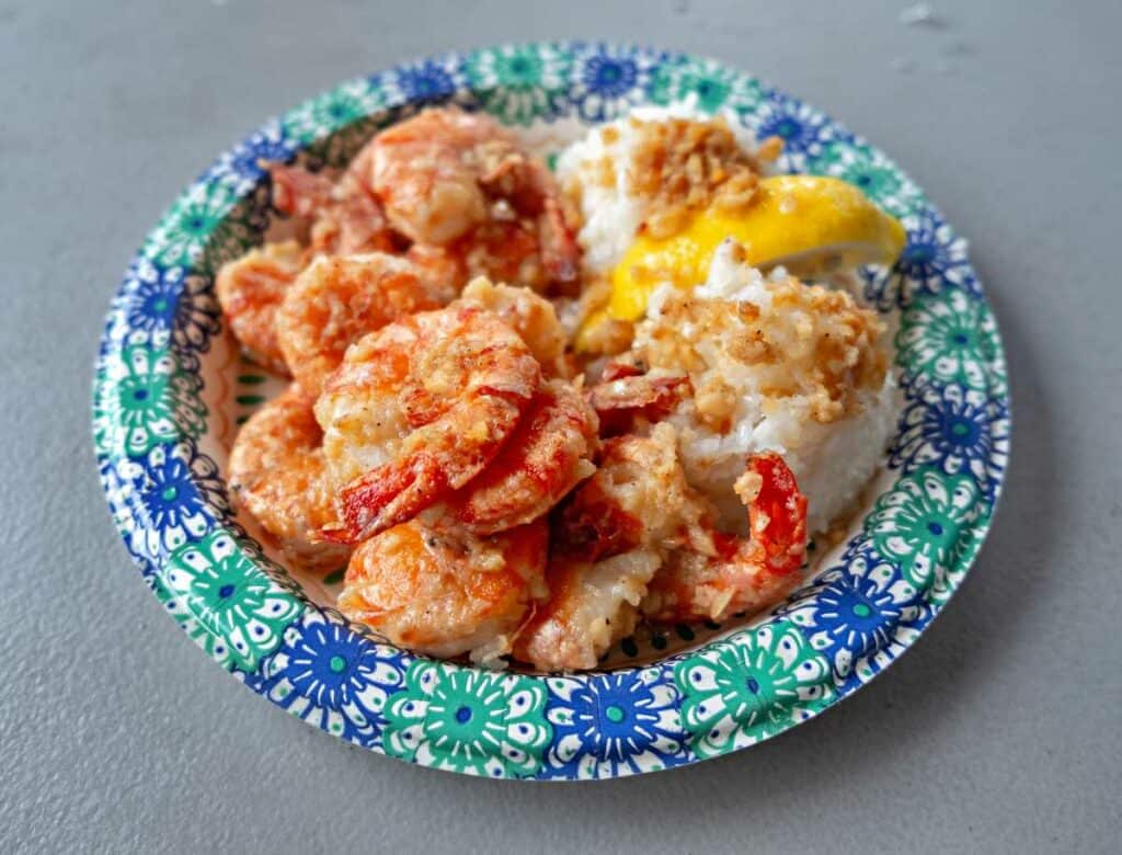 Garlic shrimps served with white rice and lemon slice - famous dish of the North Shore of Oahu, Hawaii