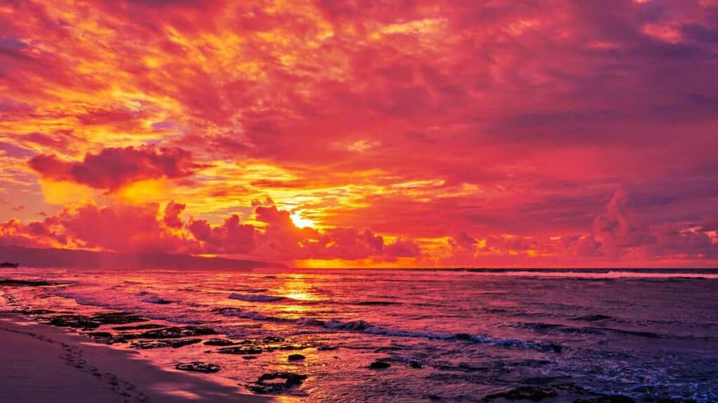 Fiery sunrise over Sunset Beach on Oahu's North Shore