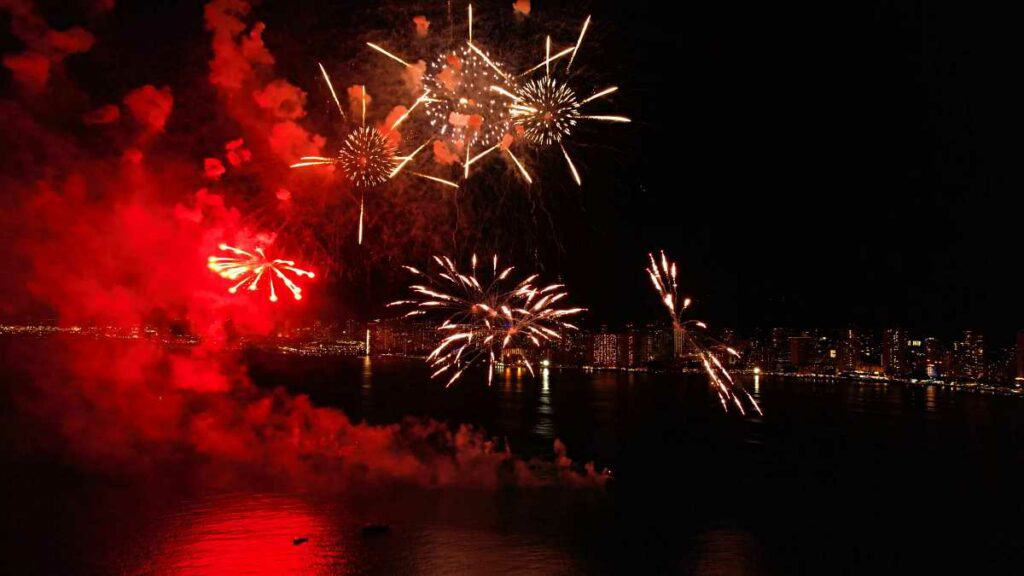 Friday night fireworks from a catamaran cruise, one of the best things to do in Waikiki at night!