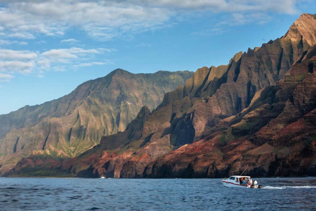 Small boat cruises along the Na Pali Coast of Kauai, HI