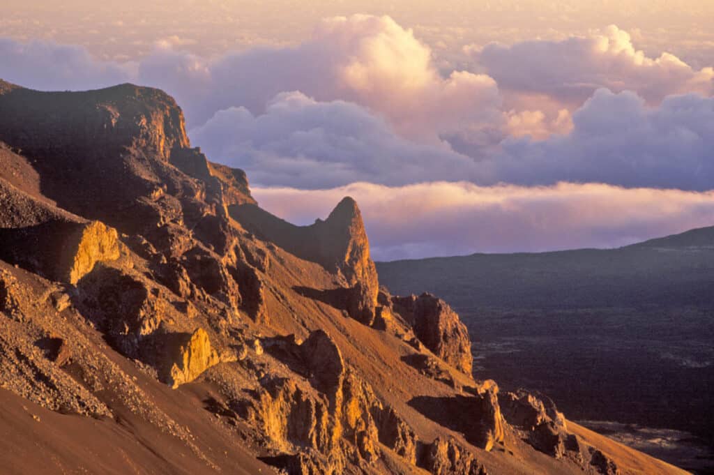 The Haleakala crater glows at sunrise in Maui, Hawaii