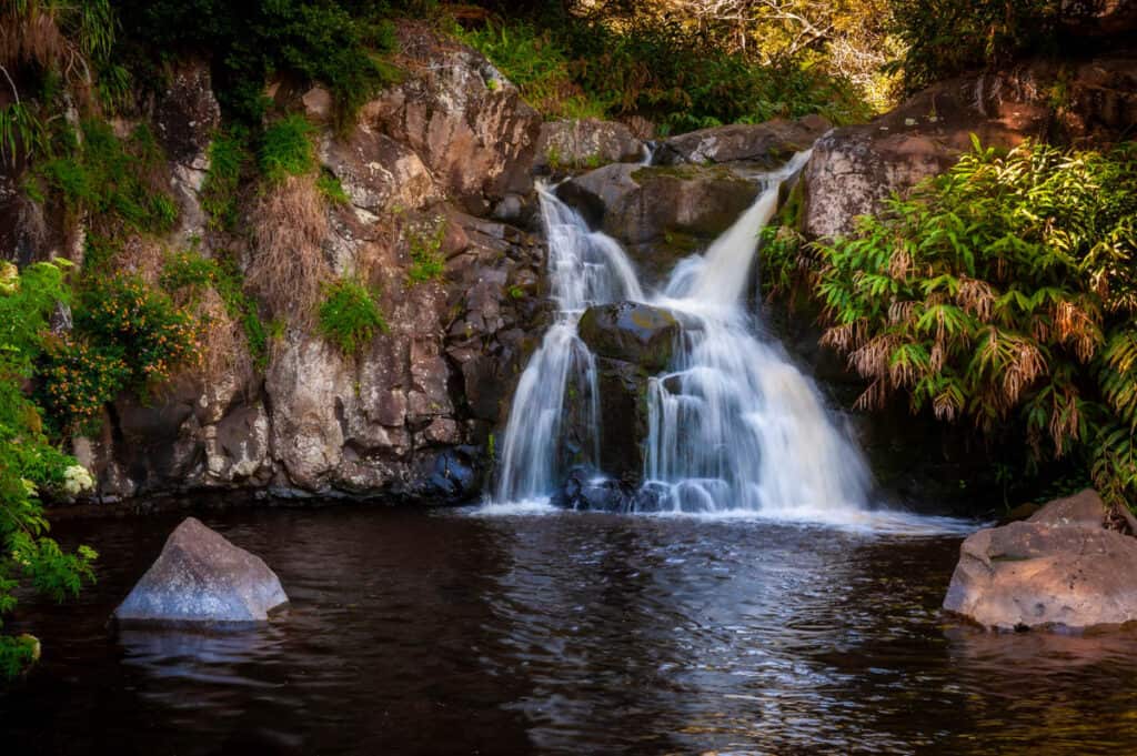 Small cascade at the top of Waipo'o Falls in Kauai HI