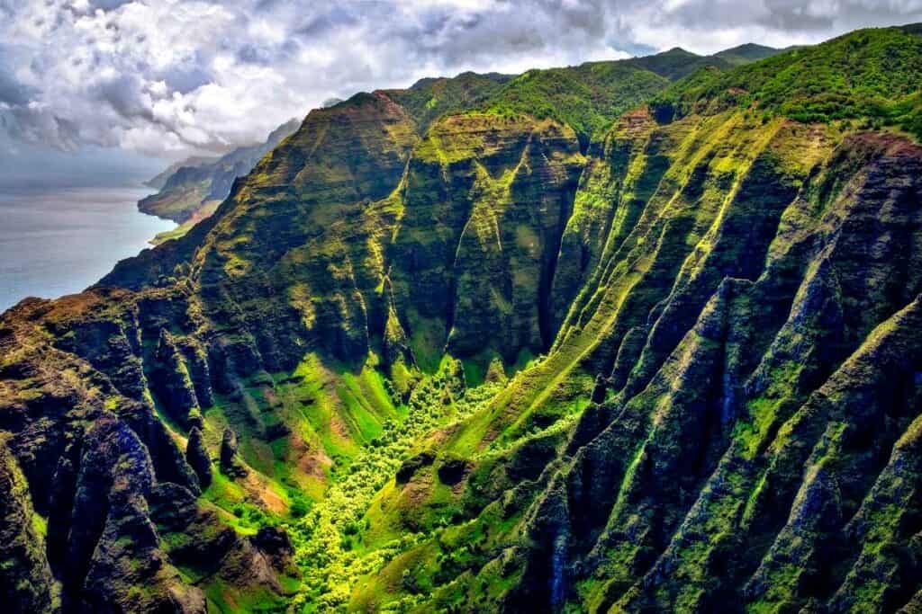 Lush green valleys and Na Pali coast from the Awa'awapuhi Trail, one of the best Kauai hikes
