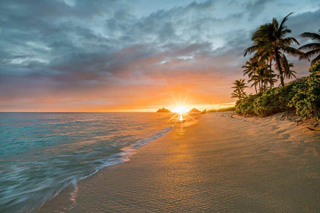 Spectacular sunrise at Lanikai Beach, one of the best Oahu beaches on the east side