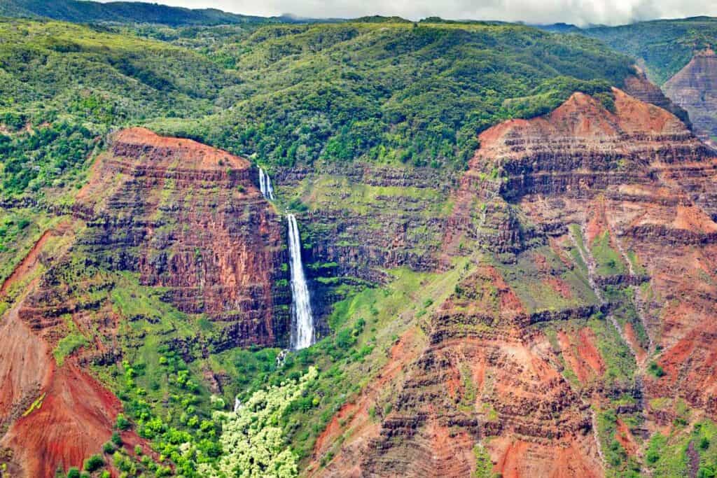 Waipo'o Falls in Waimea Canyon, a beautiful 800-foot waterfall in Kauai