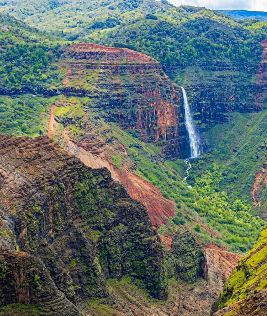 Waipo'o Falls across Waimea Canyon, Waimea State Park, Kauai ,Hawaii, USA
