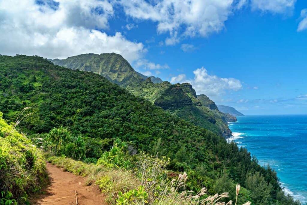 The Kalalau Trail, one of the best Kauai hikes, along the Na Pali coast