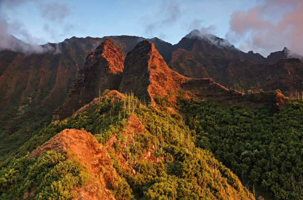 Sunset on the rugged Kauai mountain ranges from the Kalalau Trail