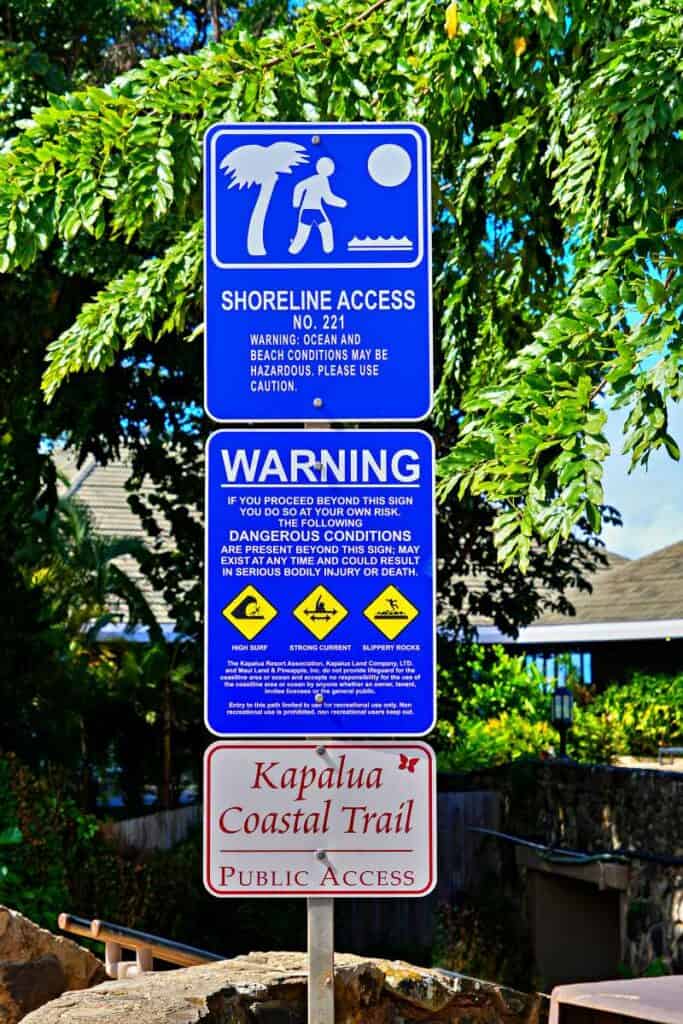 Warning sign at the entrance of the Kapalua Coastal Trail in West Maui, Hawaii