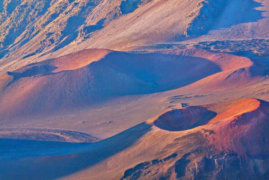 Volcanic cinder cones in Haleakala crater from the first overlook on Sliding Sands Trail, one of the best Haleakala hikes in the Summit District, Maui