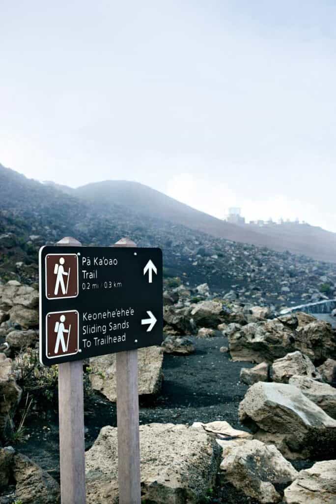 Sign at Haleakala National Park indicating direction for the Sliding Sands Trail