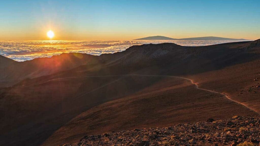 Sun rising over the Sliding Sands Trail in Haleakala National Park, Maui.