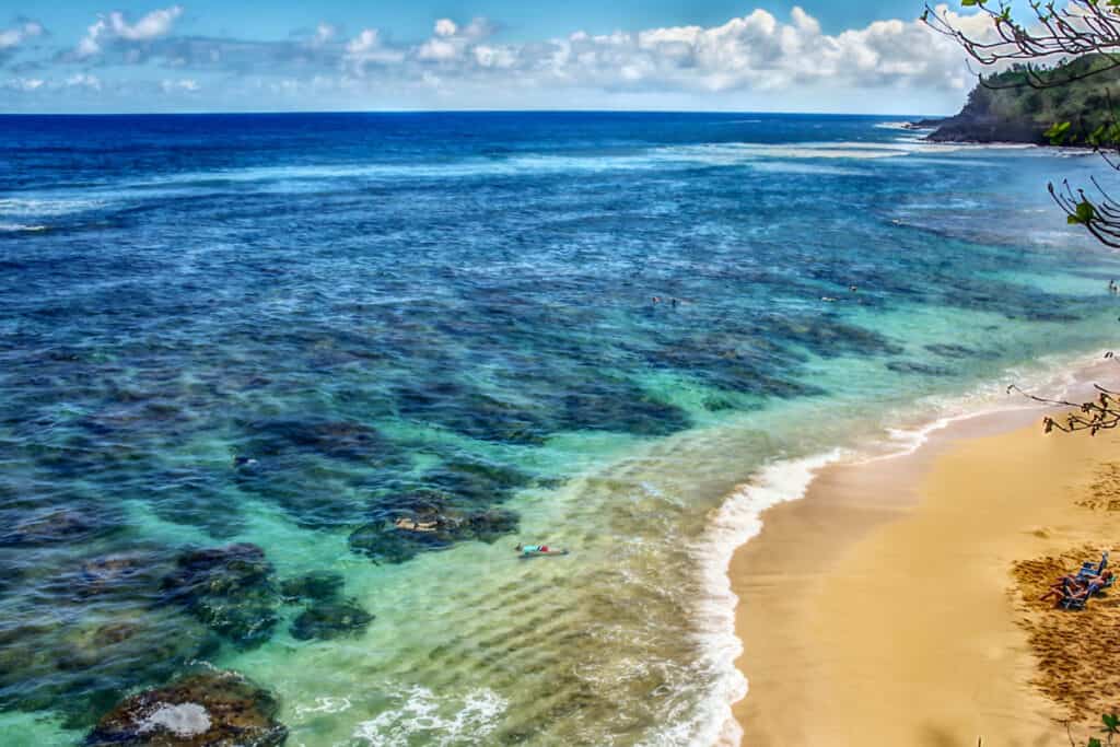 Snorkelers at Hideaways Beach, Princeville, Kauai