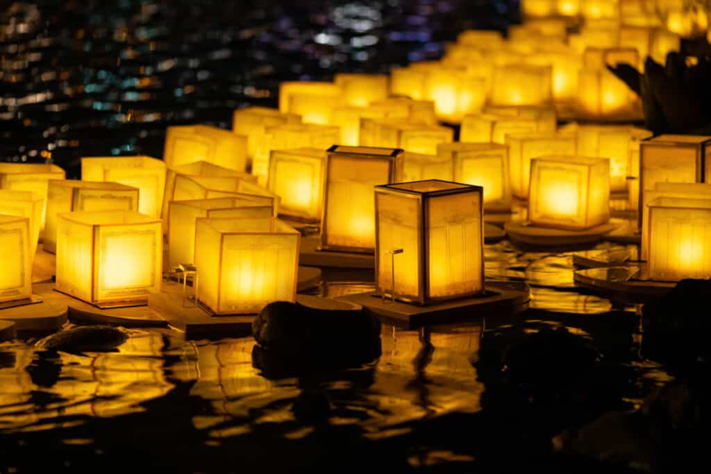 Floating lanterns on water is a part of the Obon Festival