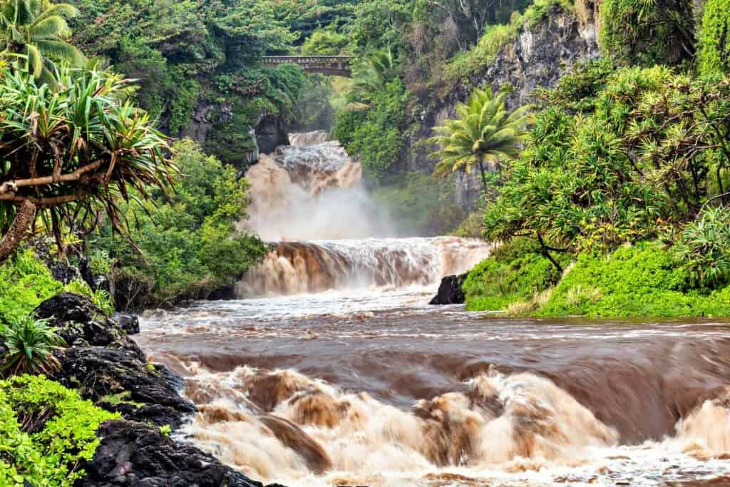 Flash floods at the Seven Sacred Pools, one of the most scenic Maui waterfalls