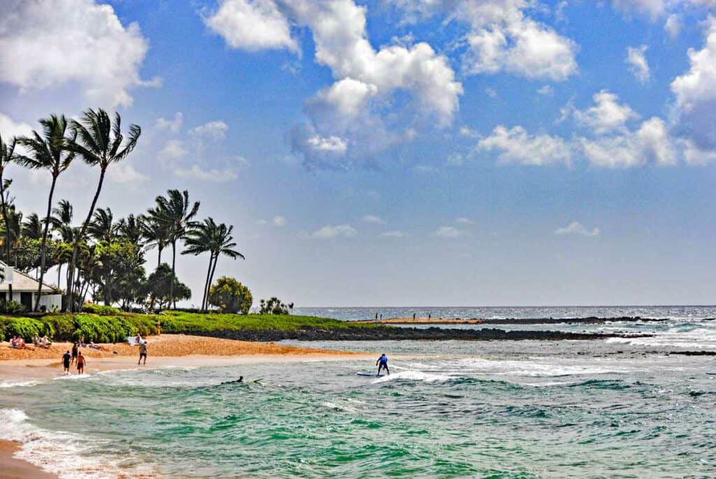 Beautiful Poipu Beach, one of the best Kauai snorkeling beaches for families with kids and beginners