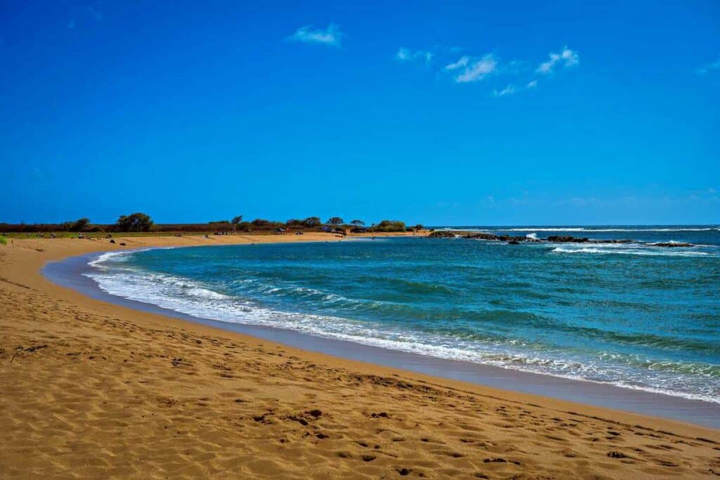 Salt Pond Beach Park, one of the best Kauai snorkeling beaches on the Southwestern side, with soft powdered sand and crystal clear waters