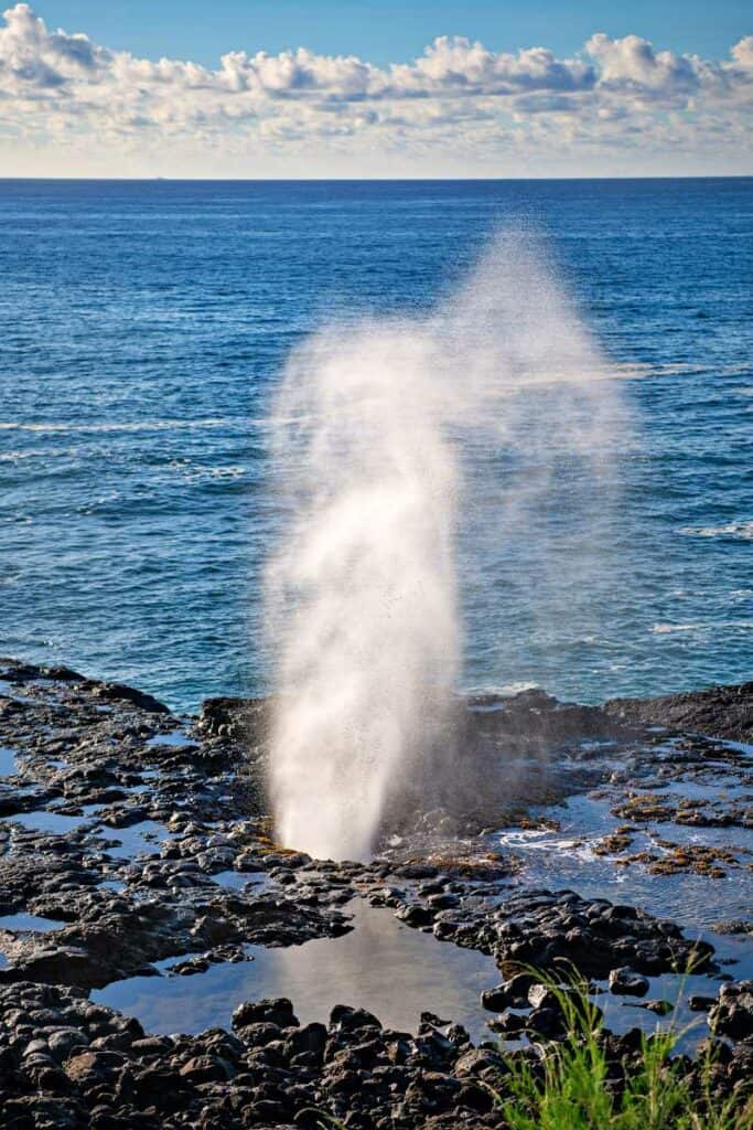 Spouting Horn blowhole erupting on Kauai, Hawaii, one of the best Hawaii blowholes
