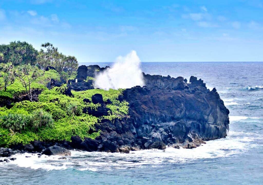 Spectacular blowhole in Wai'anapanapa State Park, Maui, one of the best blowholes in Hawaii