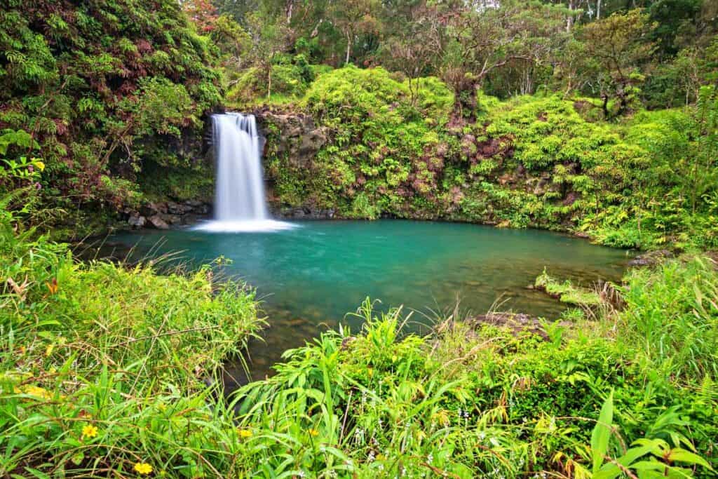 Pua'a Ka'a Falls, one of the best Maui waterfalls on the road to Hana for families with kids to swim in