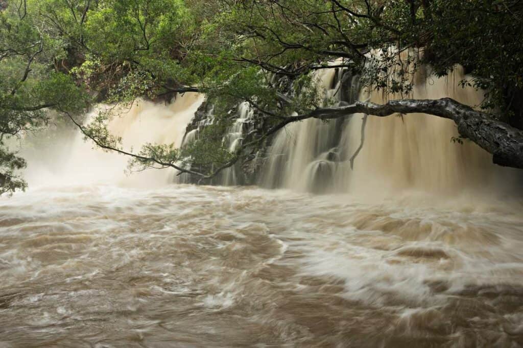 Lower Twin Falls after a tropical rainstorm, with the path to Upper Twin Falls closed | Waterfalls of Maui
