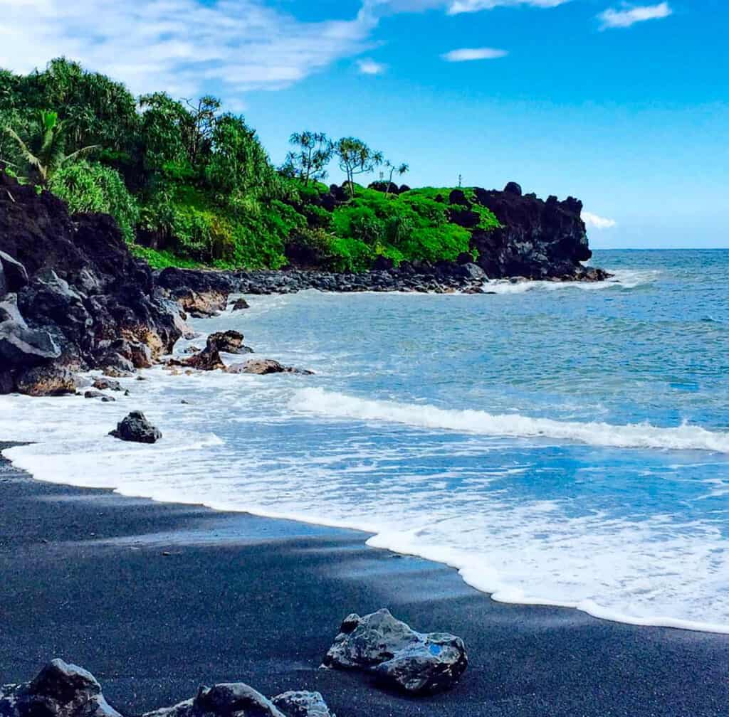Black sand beach Maui -- Pailoa Beach also called Honokalani Beach in Waianapanapa State Park near Hana in Maui, Hawaii