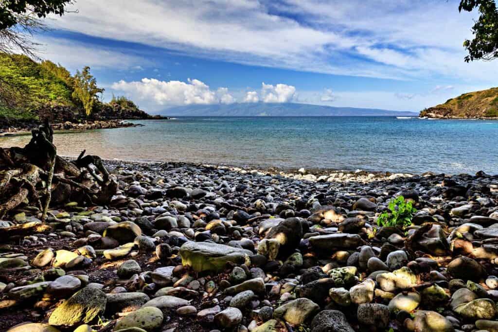 Lava rocks and gravel stones on Honolua Bay, Maui, HI