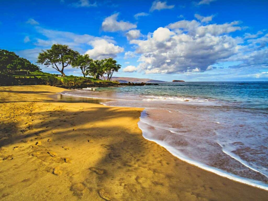 Golden sands, calm waters at Maluaka Beach, Maui, HI, great for families with kids