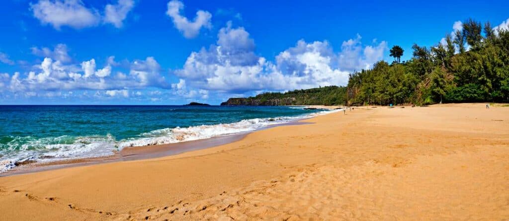 Wide expansive Secret Beach, Kauai, HI, a secluded beach paradise!