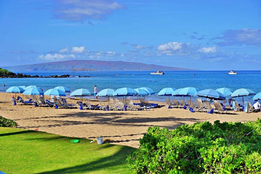 Wailea Beach, a beautiful, family friendly beach with grassy areas, finely powdered sand, and calm blue waters