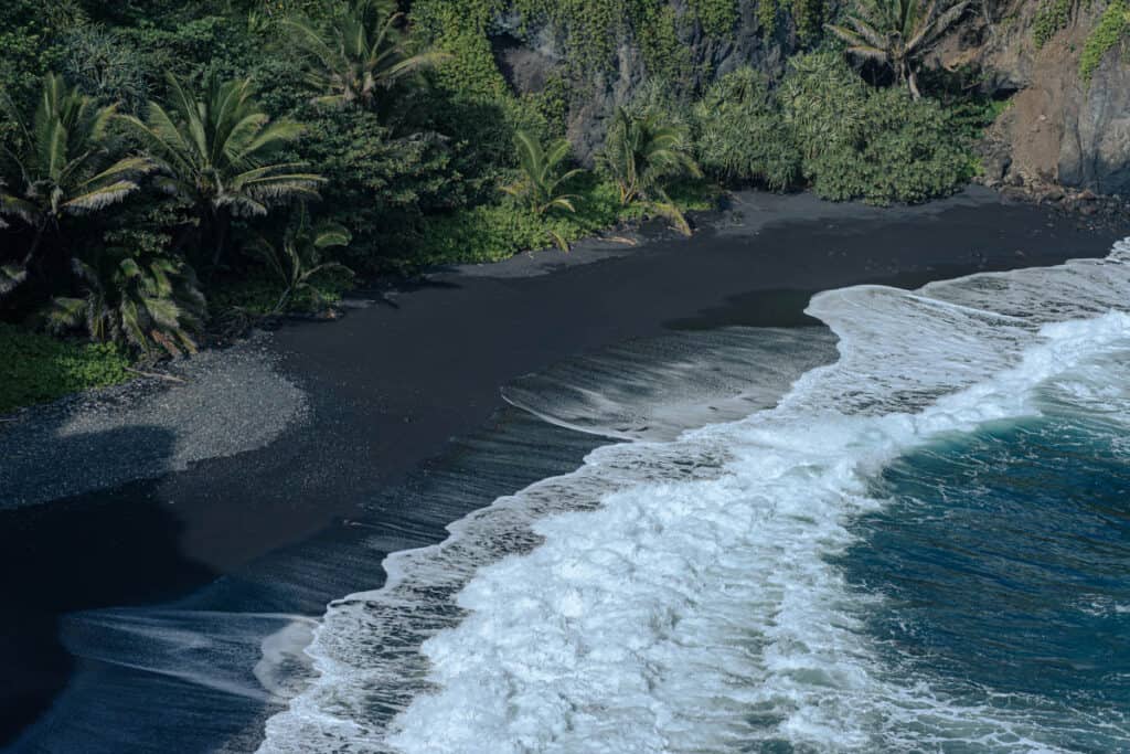 The black sand beach in Wai'anapanapa State Park in Maui, Hawaii