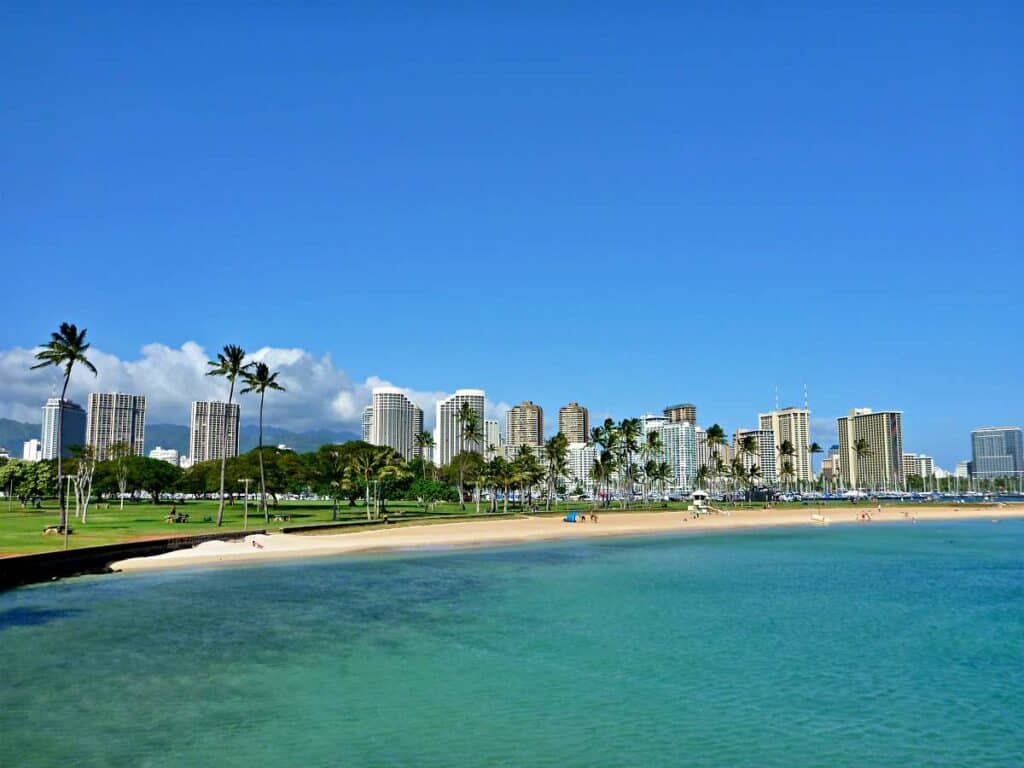 Ala Moana Beach Park, beautiful urban beach park against the Honolulu skyline