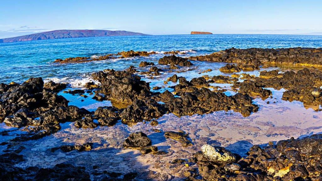 Tidepools at Little Beach, with Kaho'olawe Island and Molokini in the background
