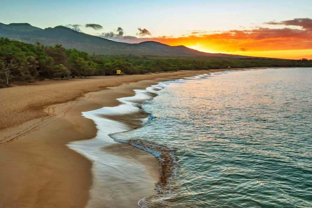 Colorful sunrise view of Makena Beach (Big Beach), Maui, HI, from path to Little Beach