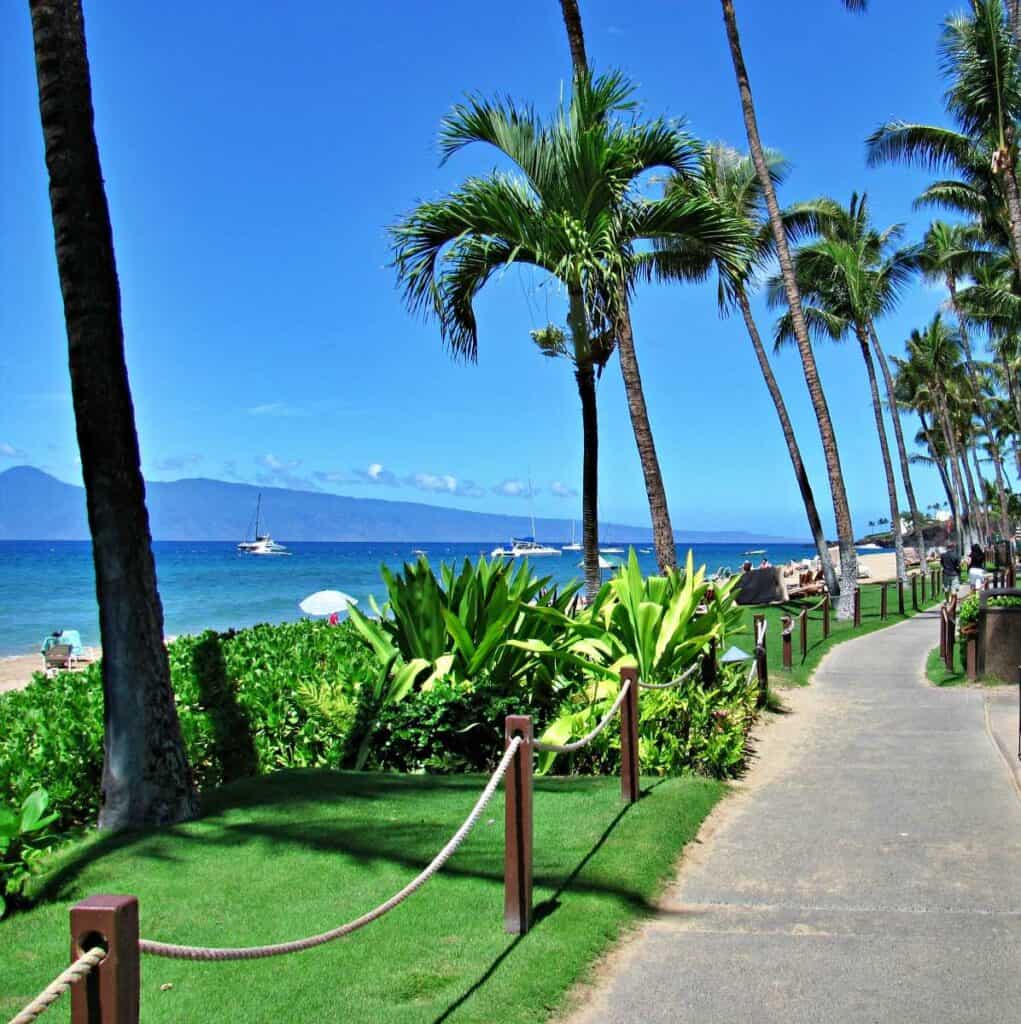Ka'anapali Boardwalk, a paved beachfront pathway connecting resorts