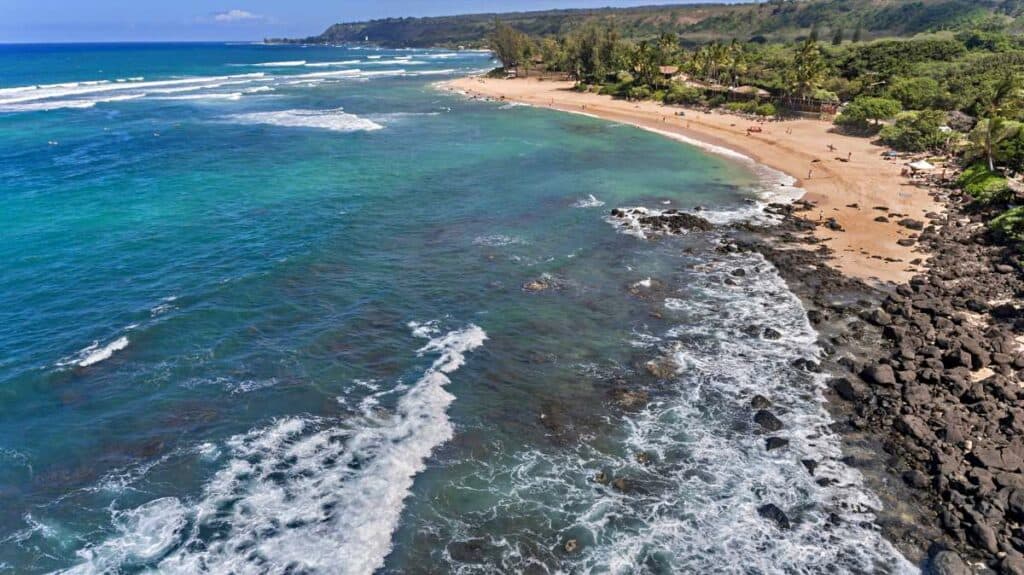 Chun's Reef, popular surf break, and sandy beach adjacent to Laniakea Beach, Oahu, Hawaii