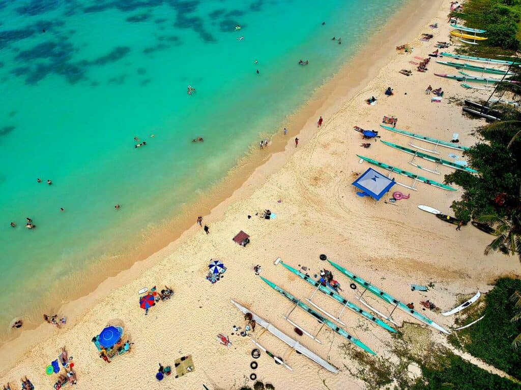 Aerial view of stunning Lanikai Beach, with canoes lined up