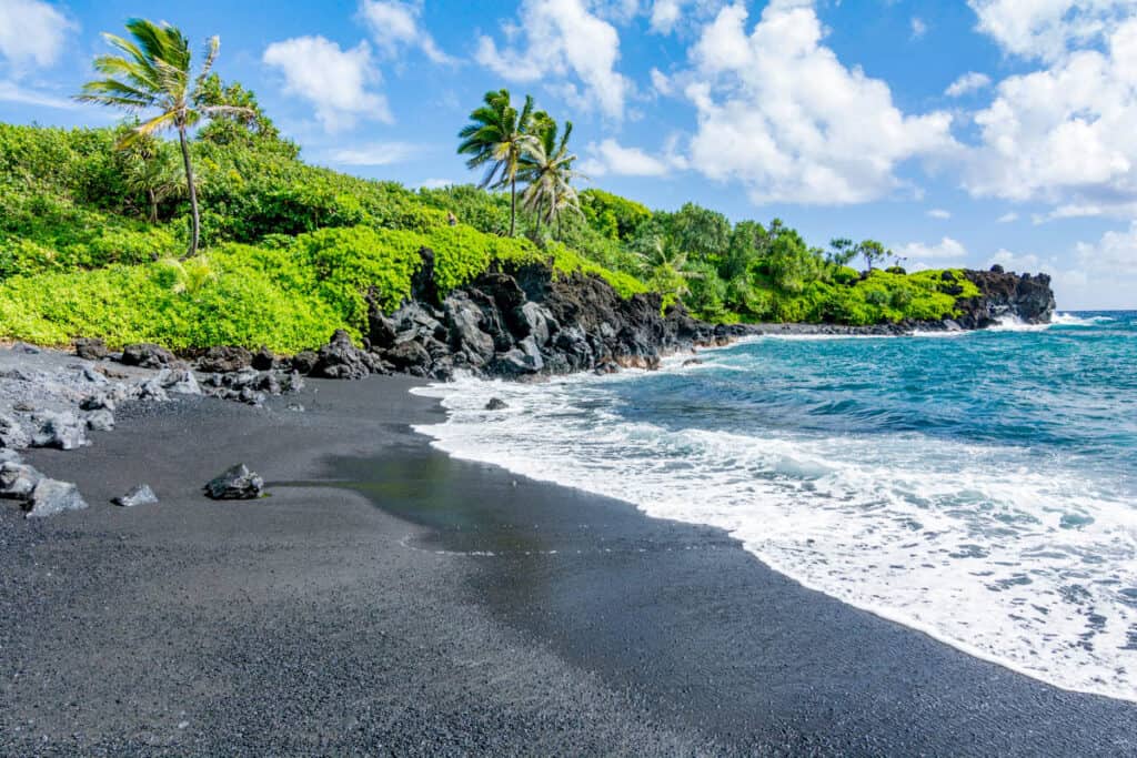 Black sand beach Maui at Waianapanapa State Park, a must-visit on any 3 days in Maui itinerary!