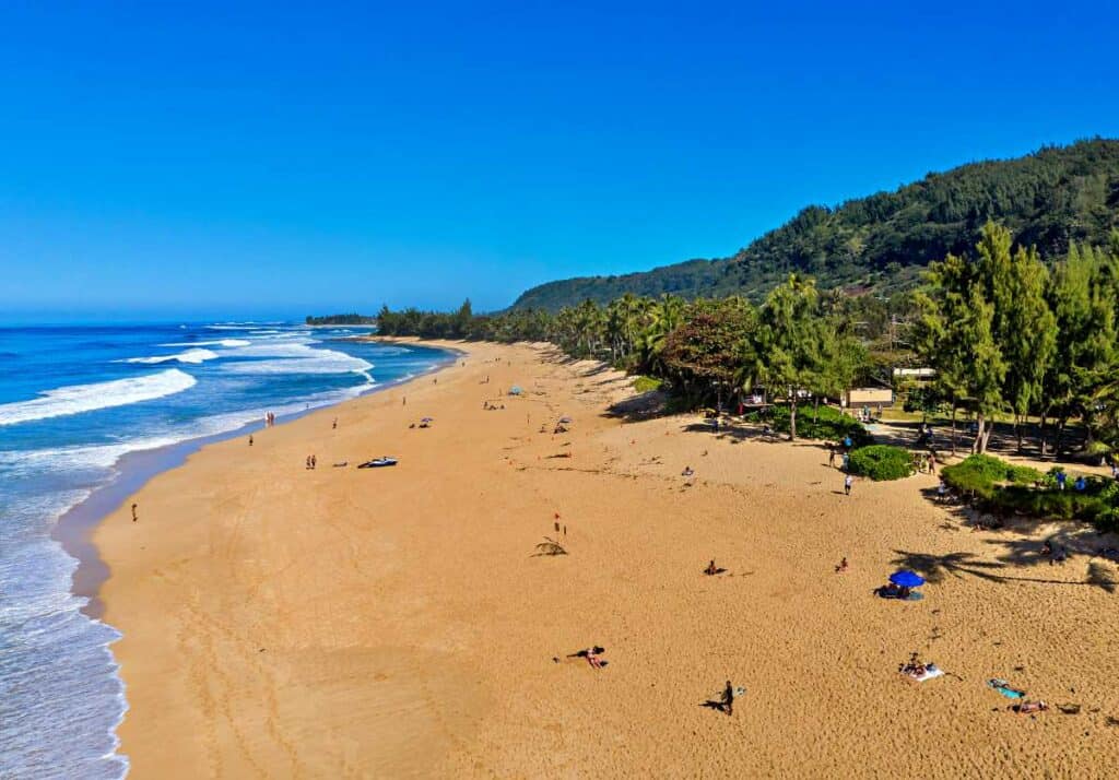 Beautiful Ehukai Beach, a white sands beach as a backdrop for the Banzai Pipeline of Hawaii