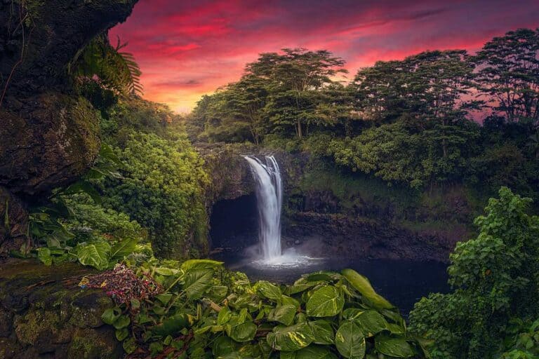 Stunning sunset colors at Rainbow Falls, one of the best Big Island waterfalls in HiLo