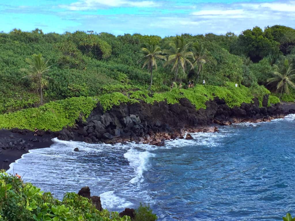 The black sand beach in Waianapanapa State Park in Maui