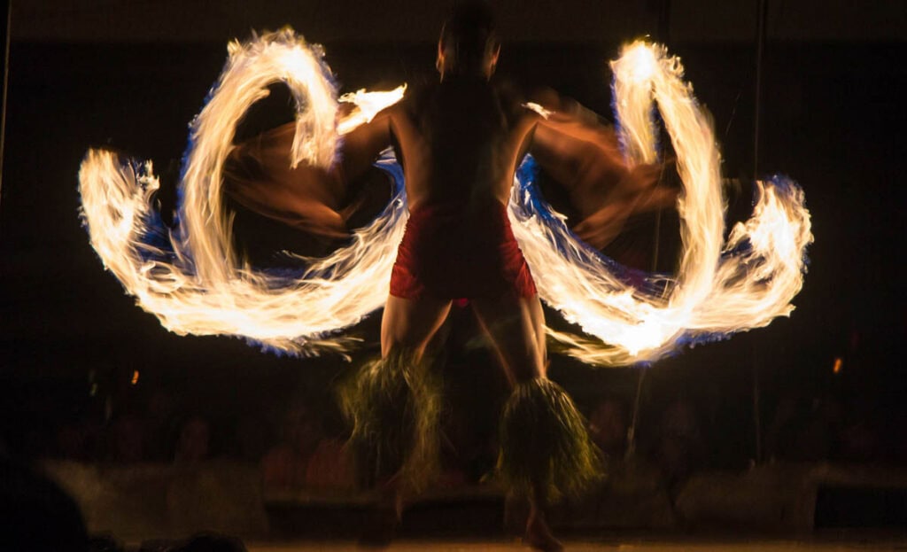 Fire dancer at a luau on Kauai, Hawaii